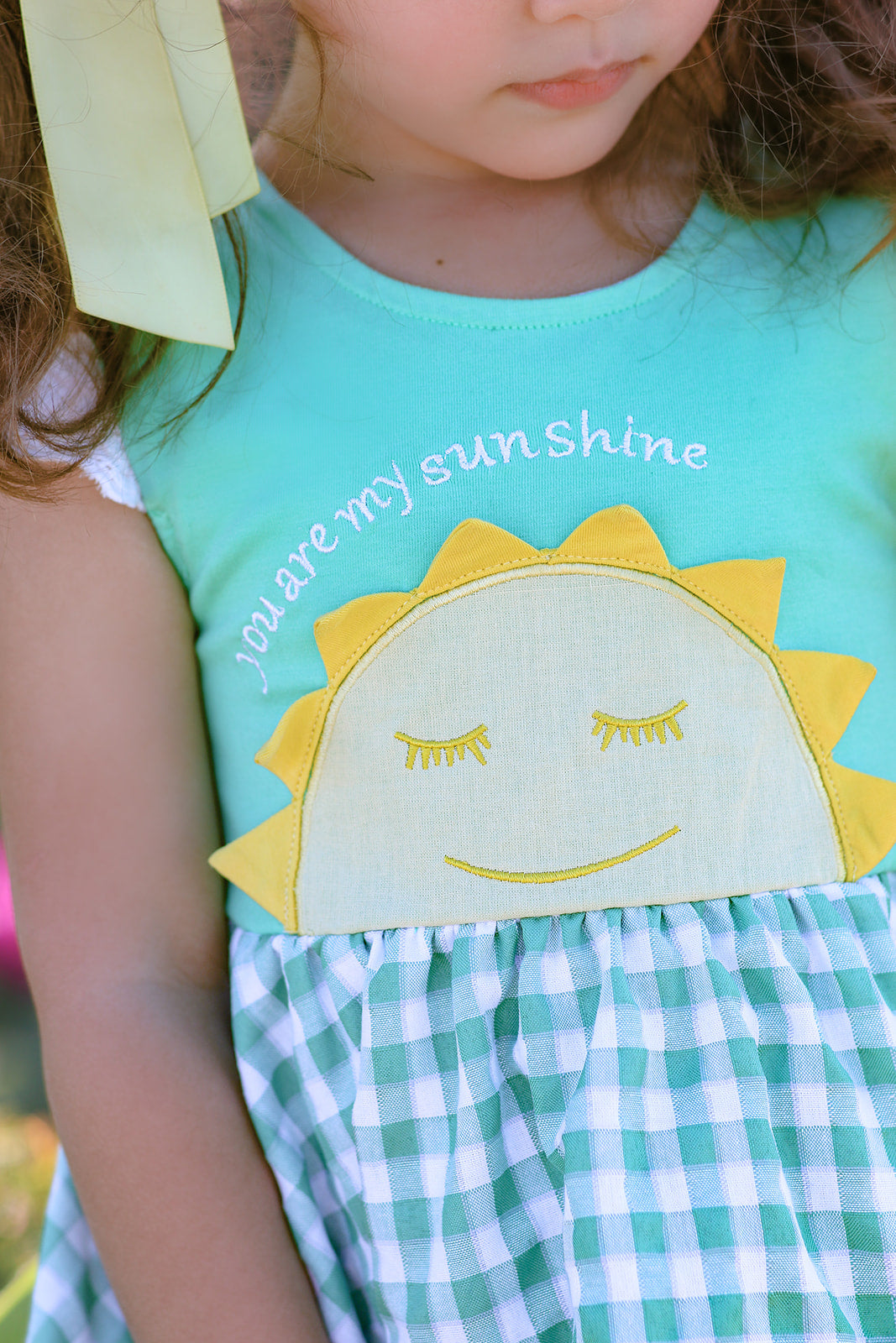 Close up of sun and embroidery
